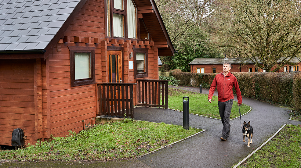 Patrick and Rosie walking through Whitemead's holiday park
